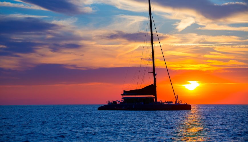 catamaran sailboat sunset